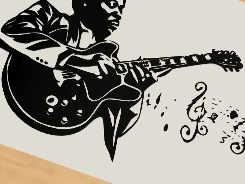 B. B. King playing guitar music