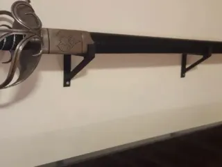 Sword wall hook for adhesive mount