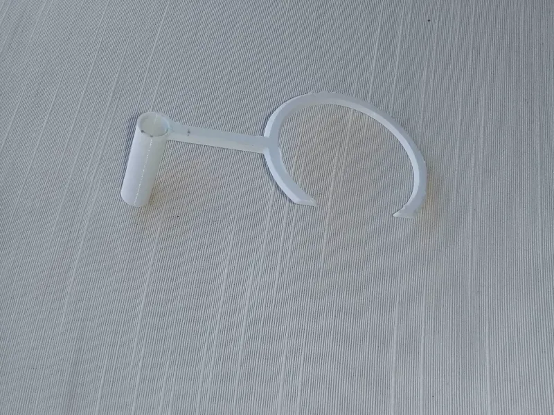 Faucet-Mounted Snap-Fit Support for Bidet Chain and Plug
