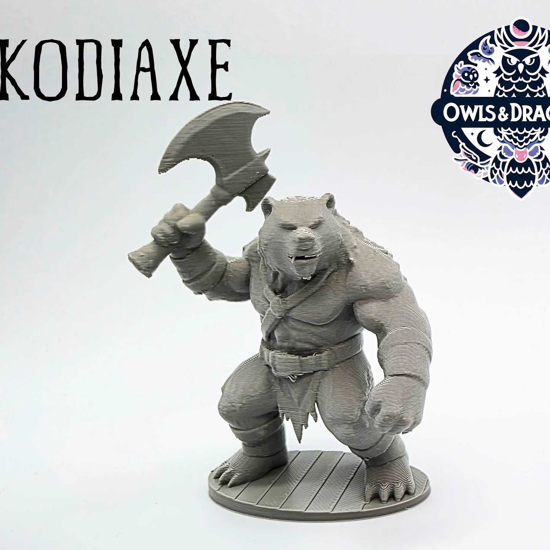 The Kodiaxe - Owls & Dragons
