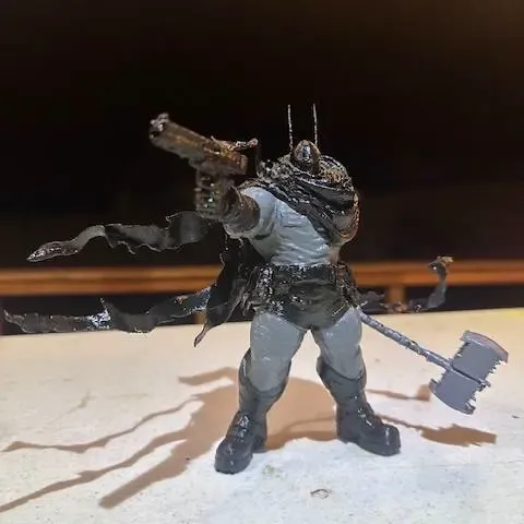 Absolute Batman mit Waffe
