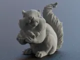 Cute Squirrel eating a Nut-1
