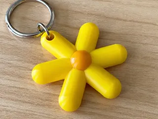 llavero flor amarilla