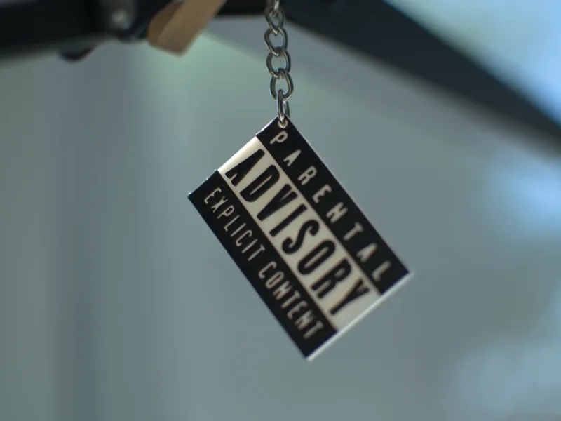 Parental advisory keychain