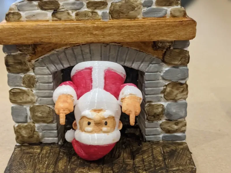 Middle Finger Santa Coming out of a Chimney