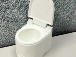 Scale model portable toilet 