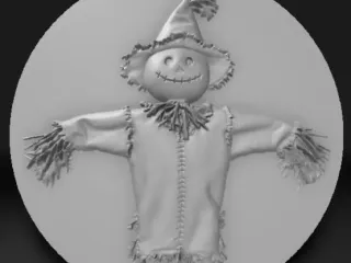 scarecrow in tattered saddle cloth clothes