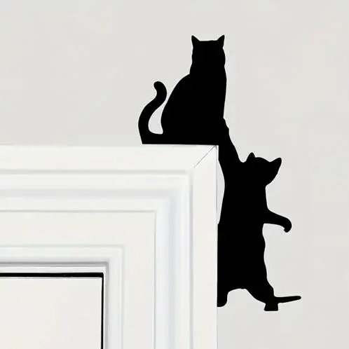 Cats - door - wall