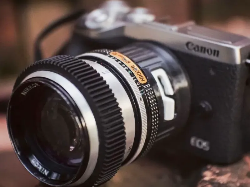 Переходник с объектива Nikon на камеру Canon M с фиксирующим штифтом