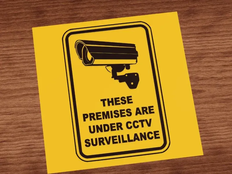 Under CCTV surveillance sign