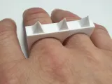 Anillo para autodefensa tipo puño americano-1