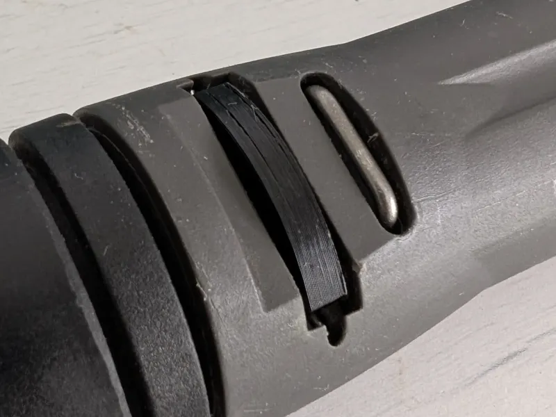 Nilfisk/Husqvarna nozzle release button