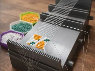 Bead weawing machine