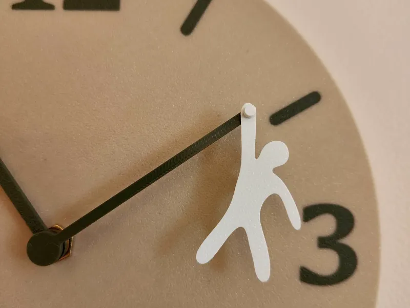 The 'Hang in there' clock, funny swinging man wall clock