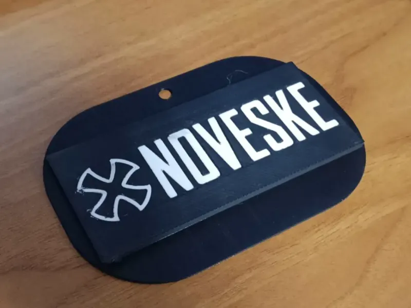NOVESKE TAG KEYCHAIN