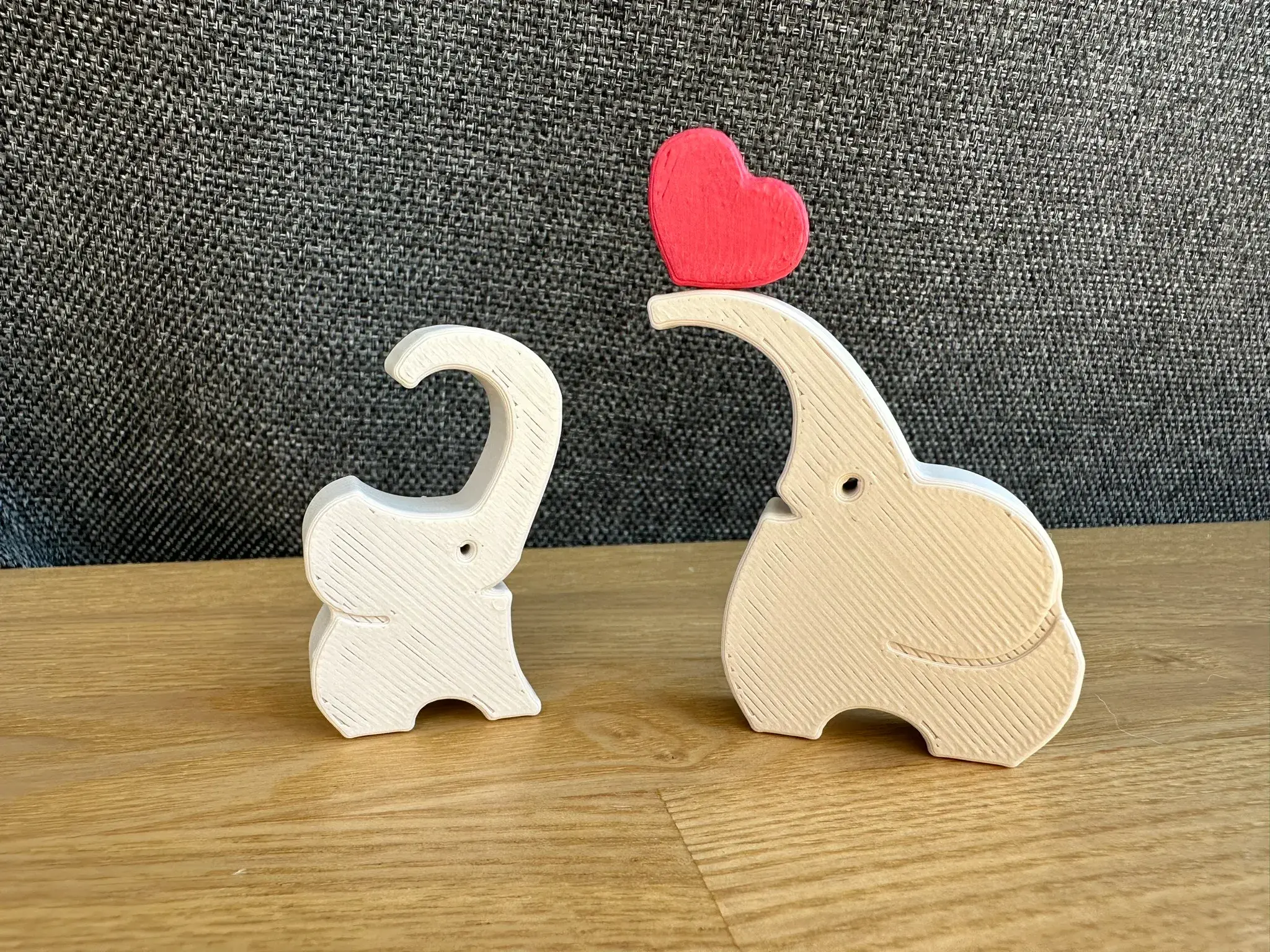 Moederolifant en babyolifant met hart