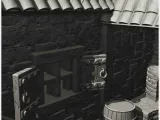 Medieval blacksmith's workshop with outdoor forge under cano-7