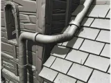 Medieval house with zinc drain pipes, canvas awning, entranc-5