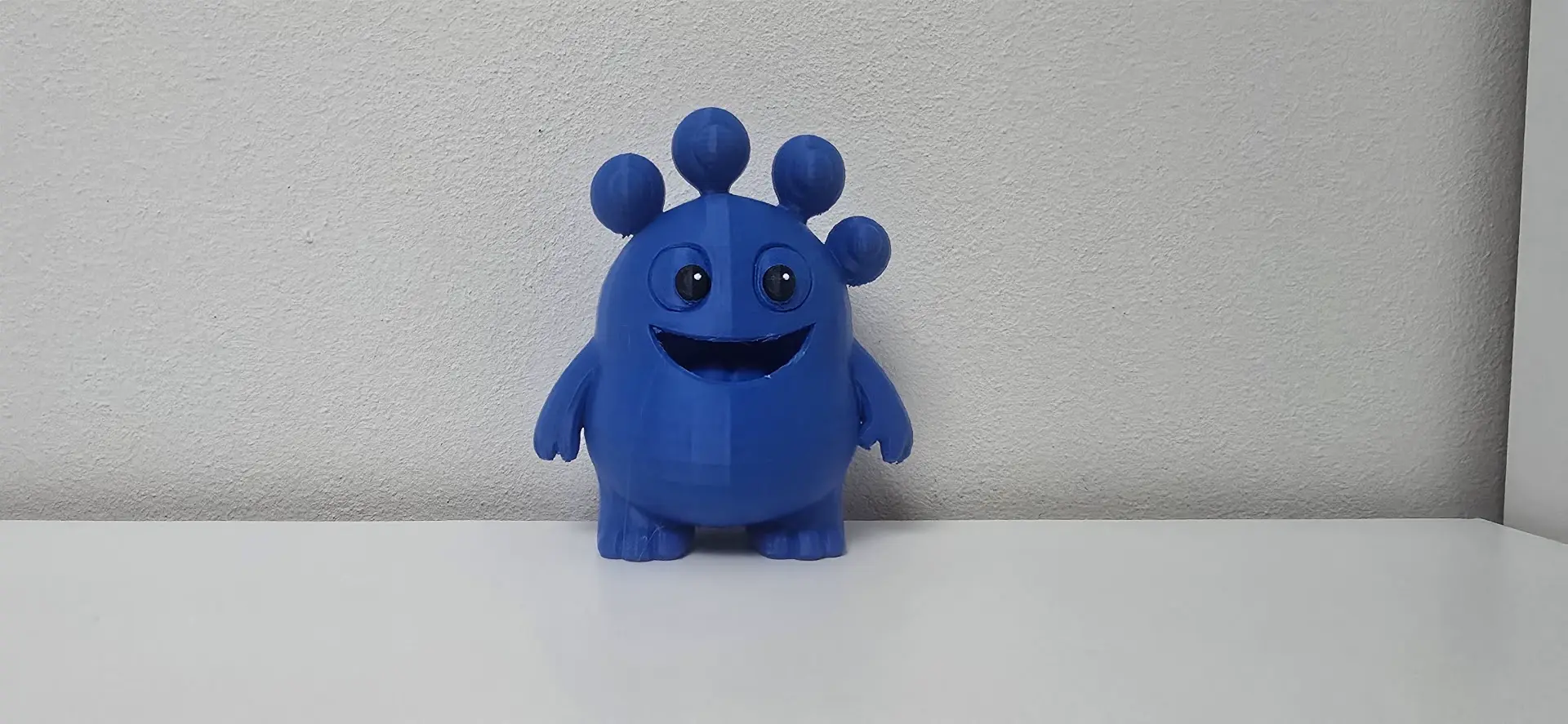 Smiling Spiked Monster with Open Mouth Toy