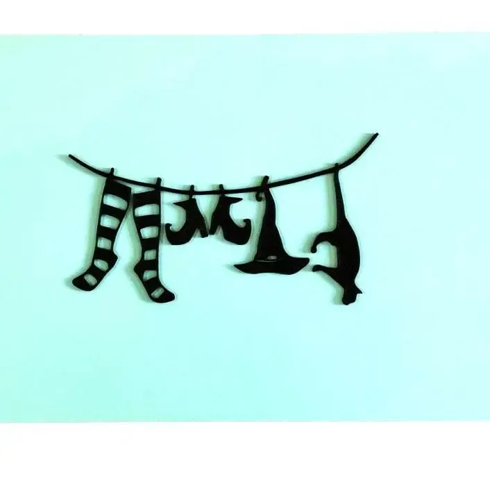 a witch's clothesline wall art