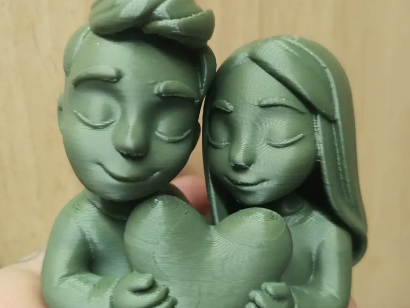 Love Couple Holding a Heart Romantic Valentine Figurine