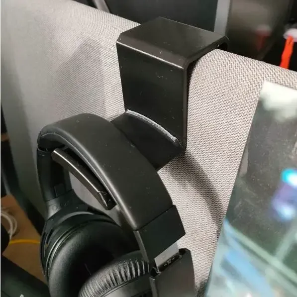 Headphone holder mounted on cubicle divider