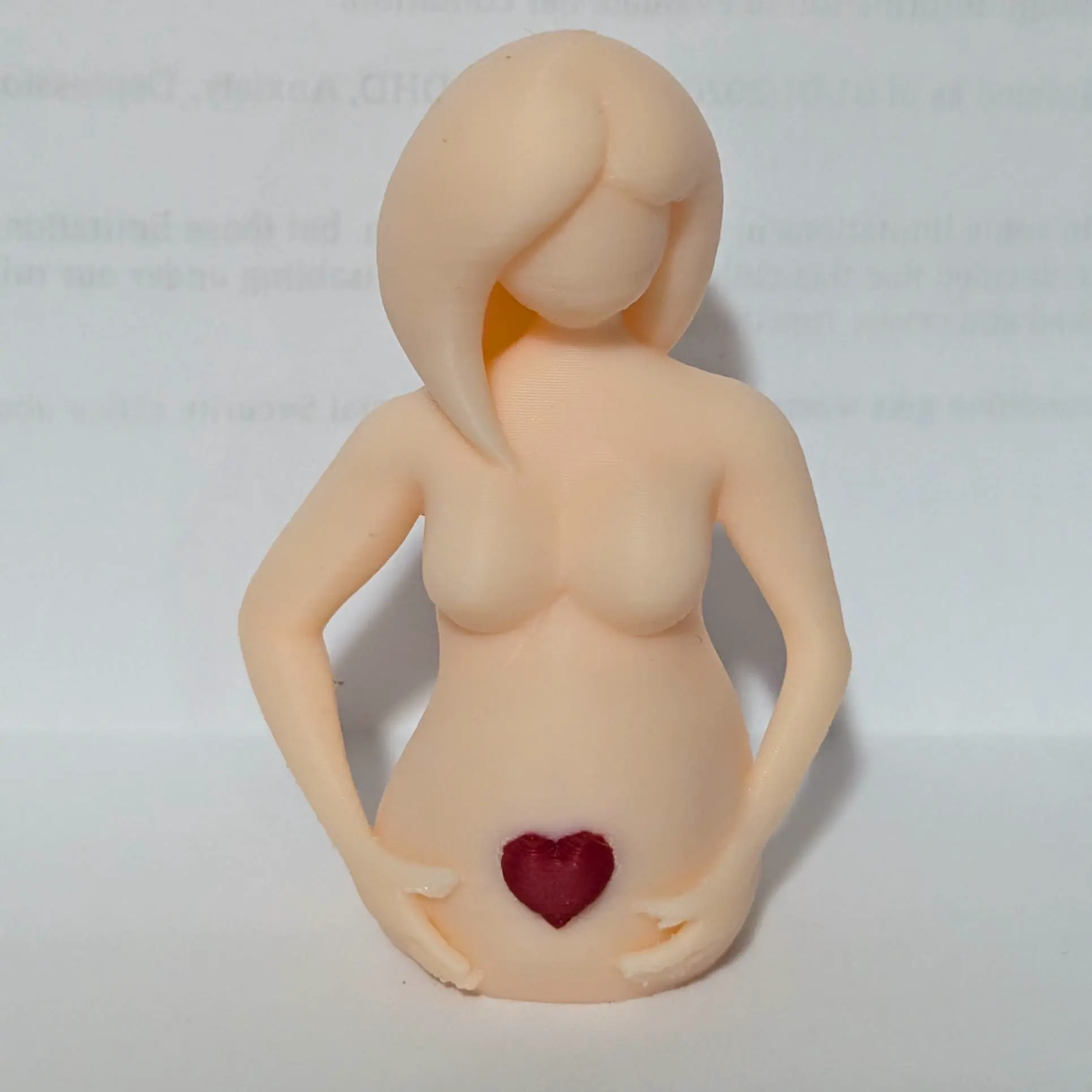 Excepting Mother with a heart on her baby bump