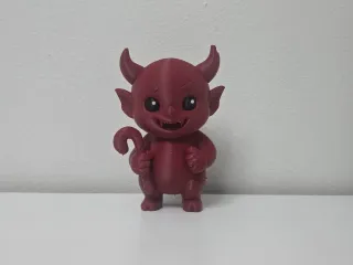 Smiling Demon with Candy Cane Christmas Figure