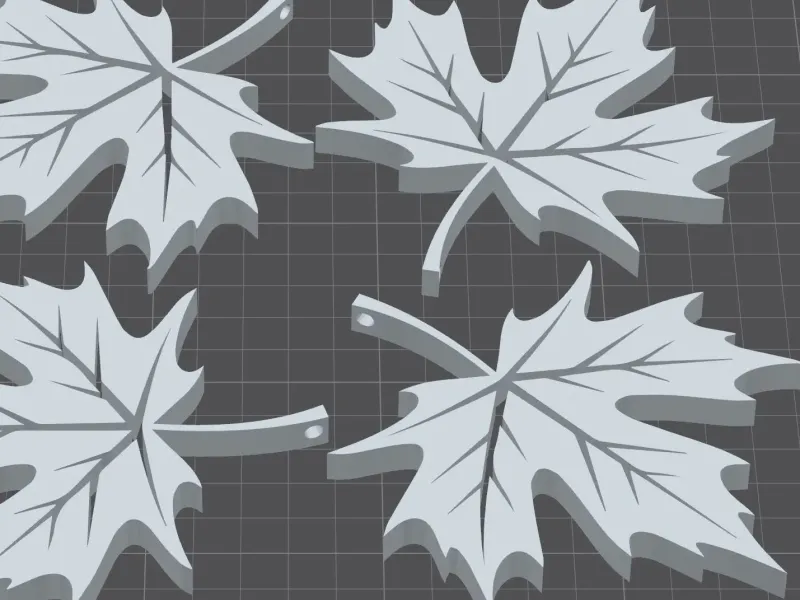 Maple leaves with holes for stringing up