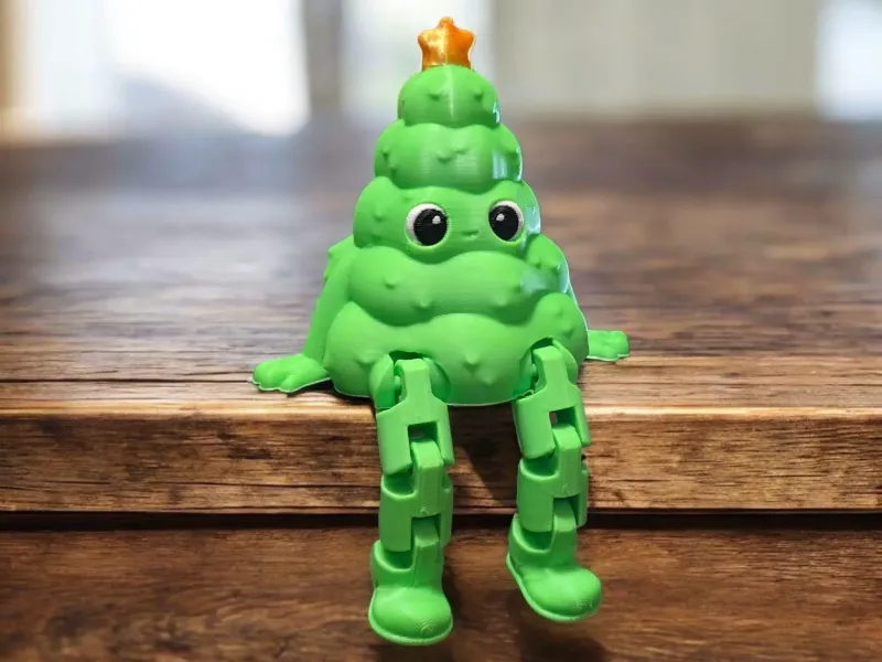 Árvore de Natal com Pernas Flexíveis em uma Prateleira