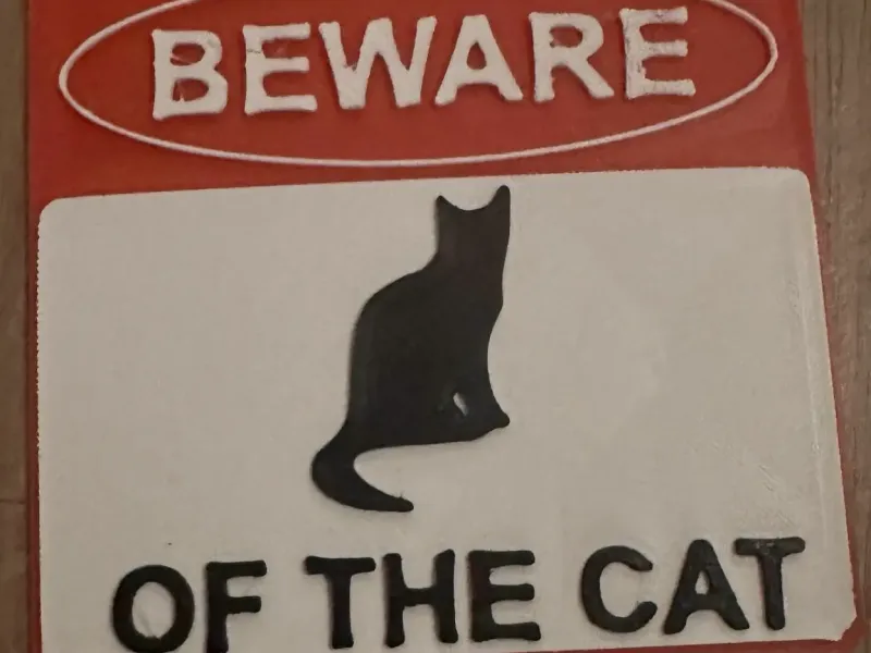 BEWARE OF THE CAT SIGN