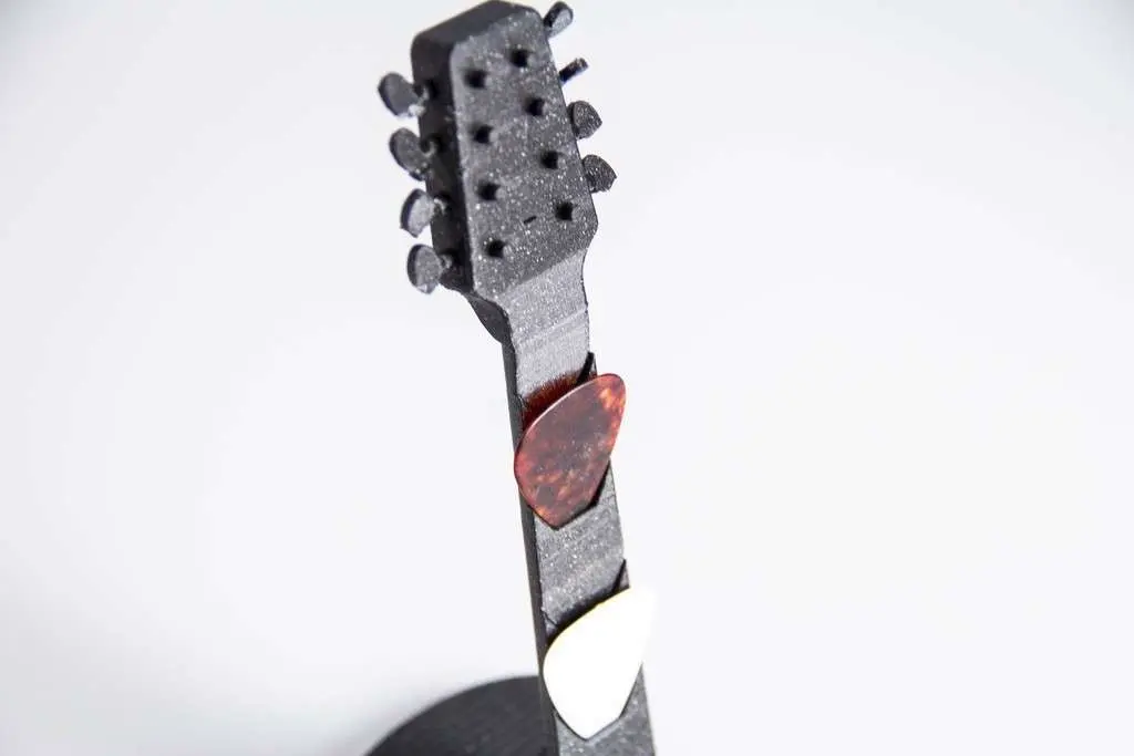 Soporte para púas de guitarra