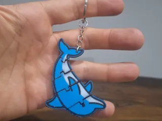 Flexible keychain in the shape of a dolphin