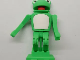 Hits knee frog Domino