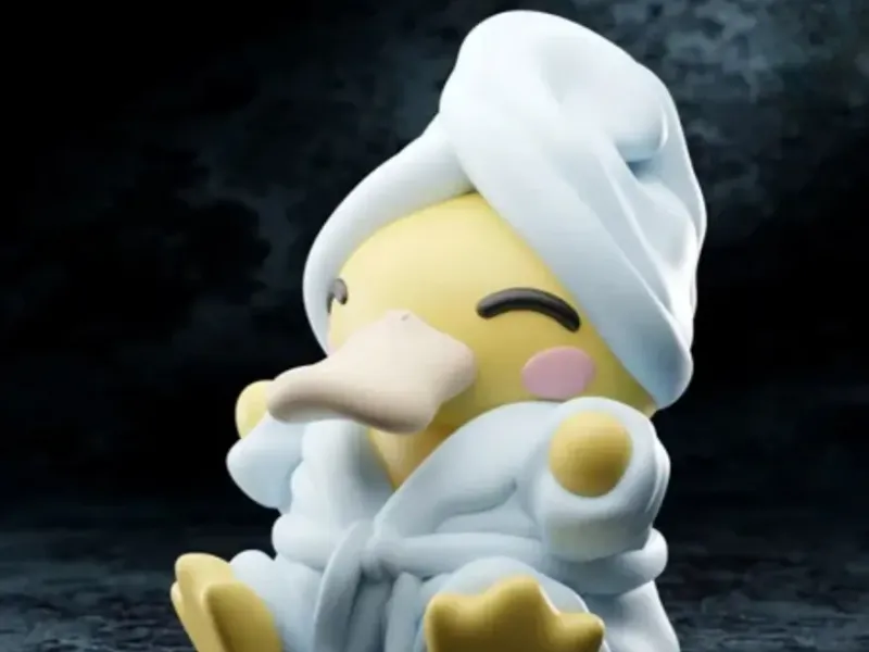 figurine pokémon psykokwak en peignoir 
