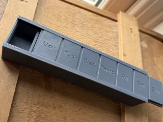 Pill Box with Sliding Lid