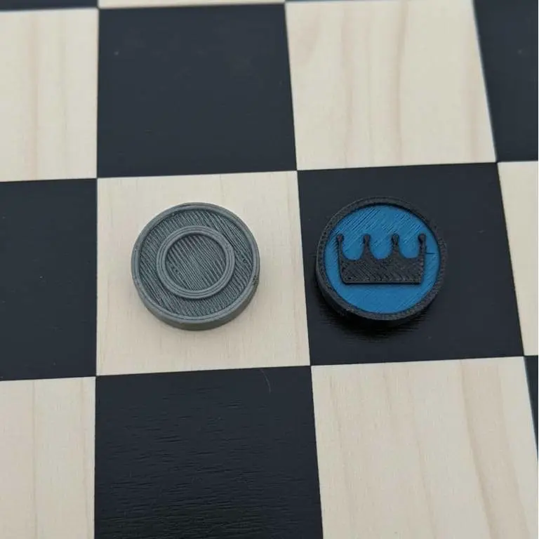 Peça de dama com 2 faces.