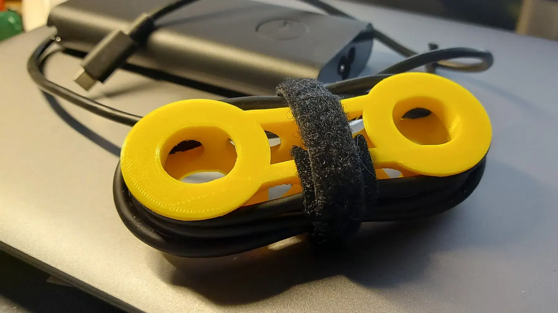 Laptop charger cord spool