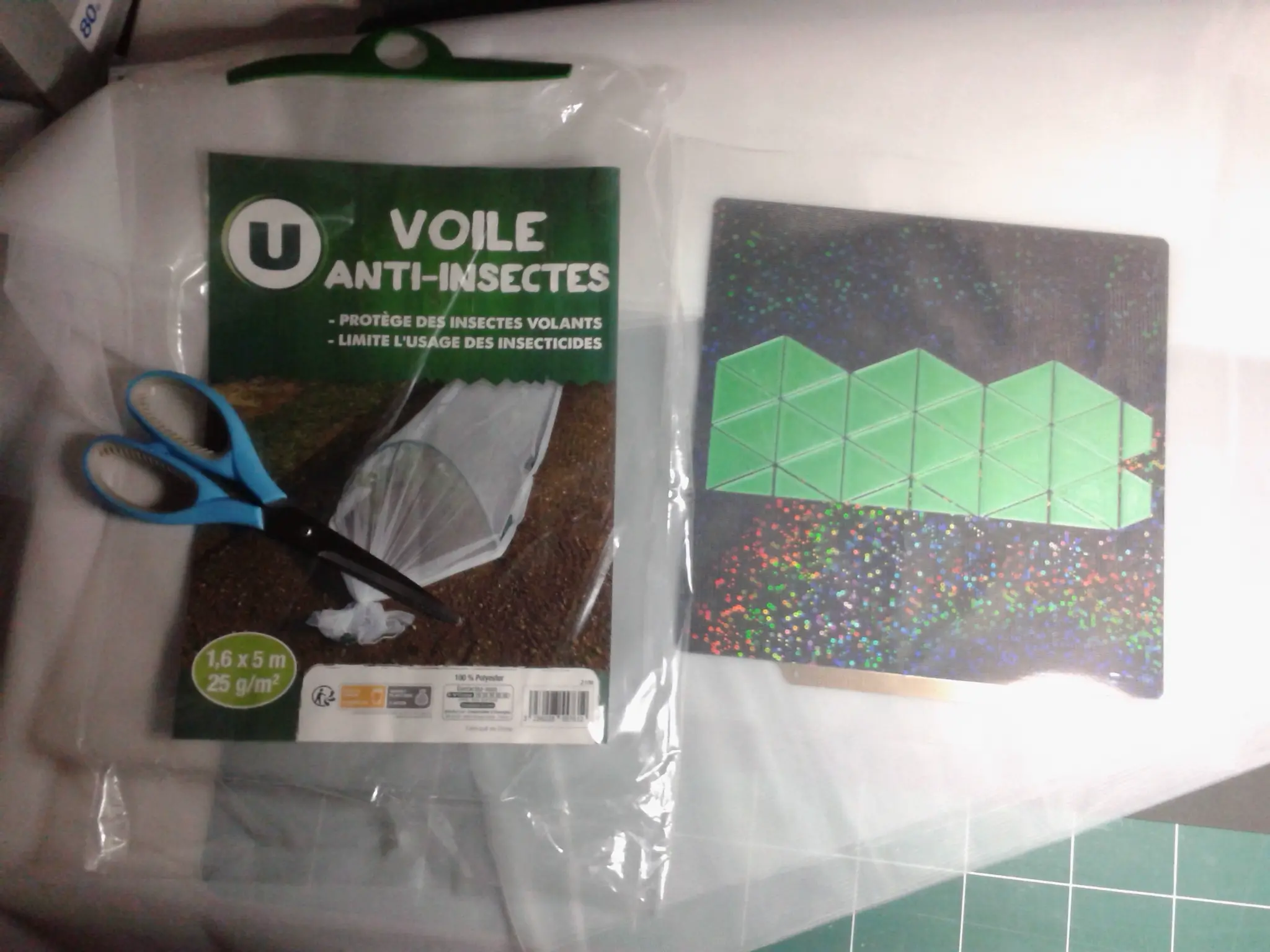 Caleidociclo con textil intercalado entre dos capas