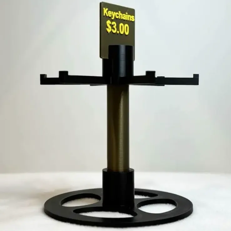 Spinning customizable keychain display