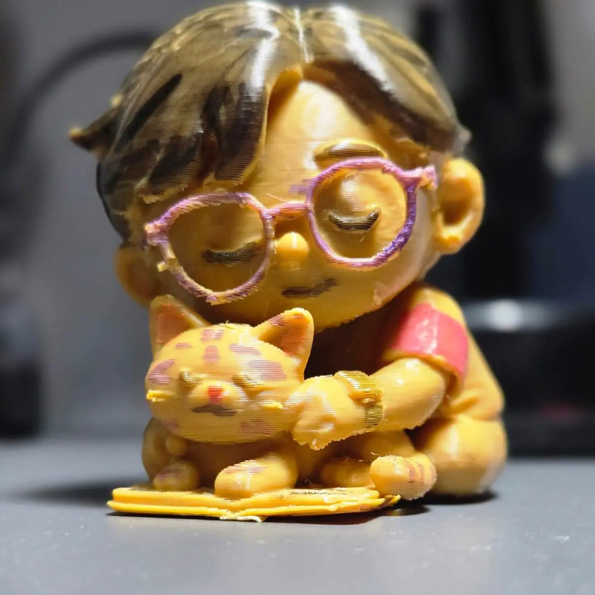 A girl, a cat and a book