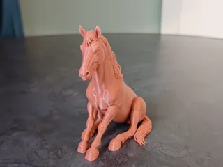 Realistic Sitting Horse Figurine