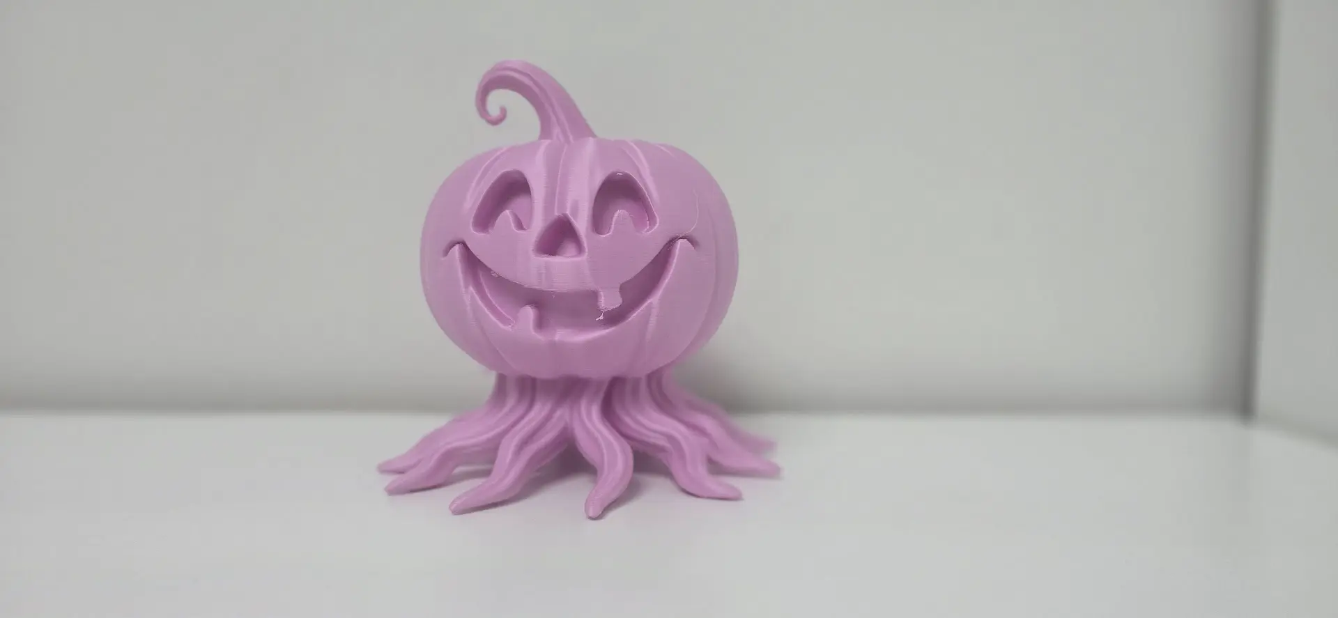 Halloween Smiling Pumpkin with Roots