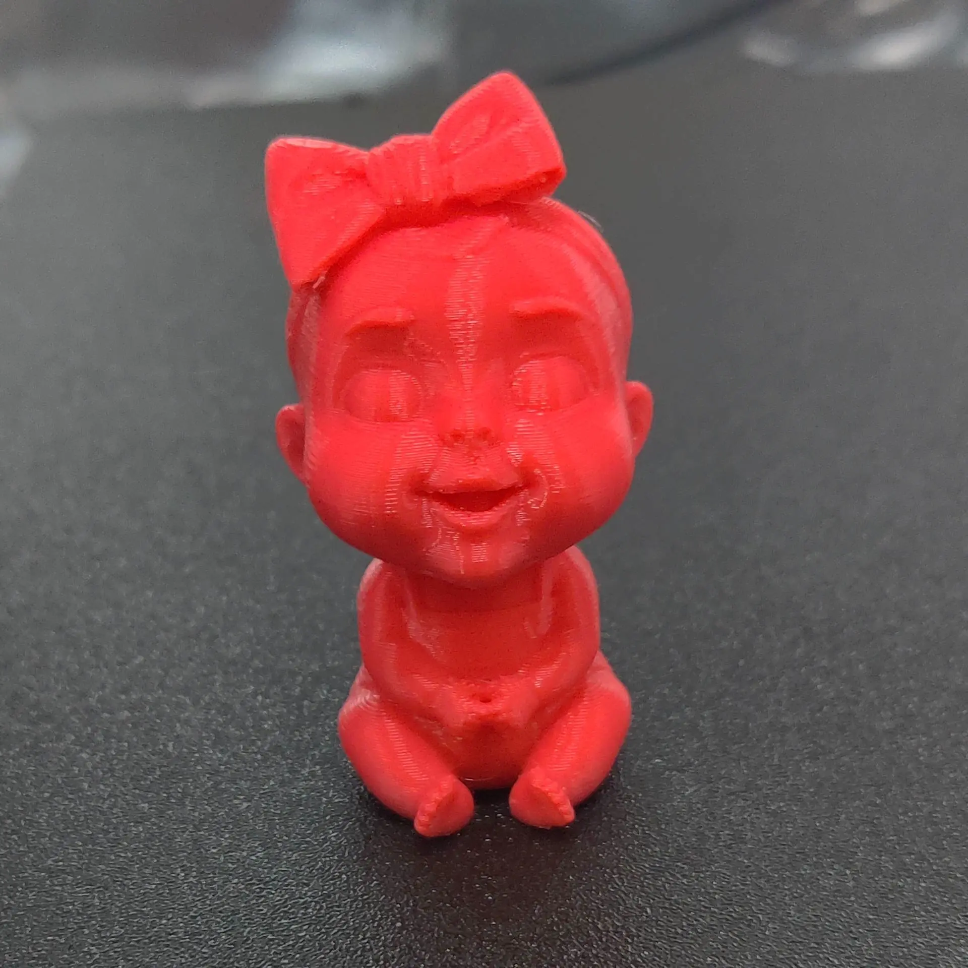 Adorable 3D printed baby girl figurine