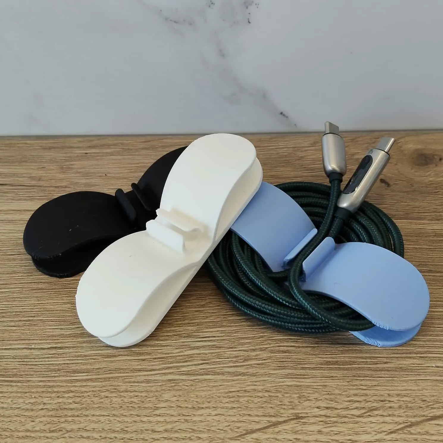Stick-on cable organizer