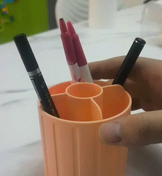 Rotating pen holder