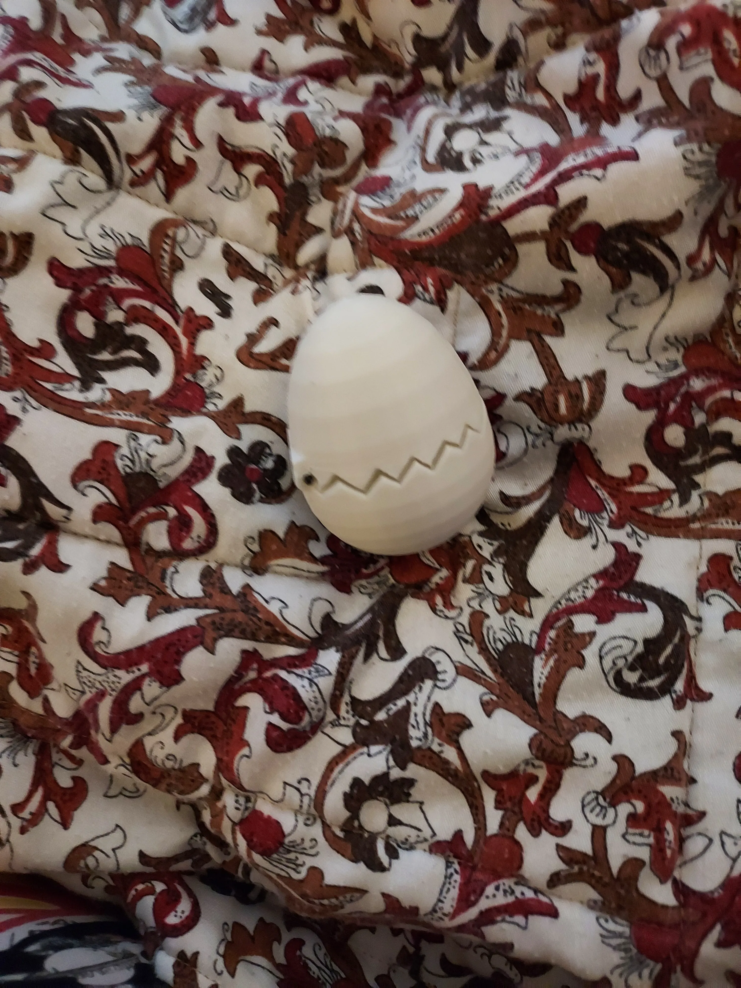 Hinged Egg for putting miniature animals or creatures in.