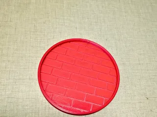 Brick-patterned coaster
