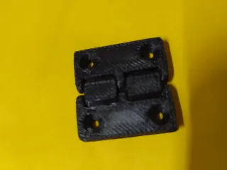 Reversable hinge with screw holes