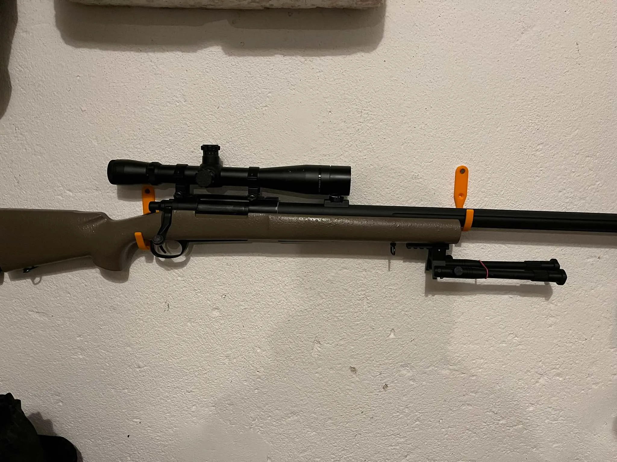 Airsoft gun mounts on the wall
